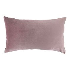 a pink velvet pillow on a white background