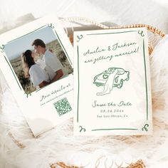 an image of a couple on their wedding day with the save the date card in front