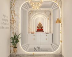 a white room with gold accents and a buddha statue