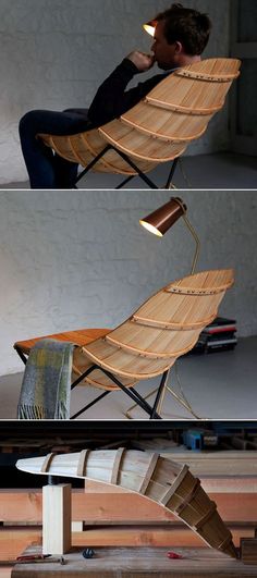 a man sitting in a chair made out of wooden planks with a light on it