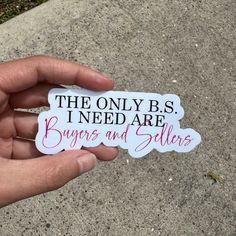 a hand holding a sticker that says the only b s i need are buyers and sellers