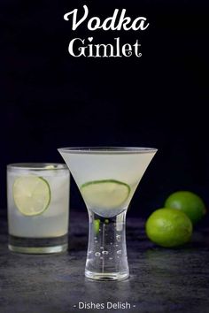 two glasses filled with vodka and limes