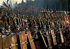 a large group of men dressed in armor and helmets