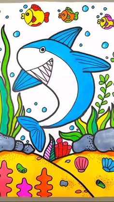 a drawing of a shark and fish in the ocean