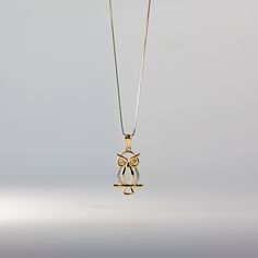 For centuries, the owl has long been represented as a symbol of great wisdom. Let the spirit of the owl lift you into the skies with this stunning 14K solid gold own pendant. Known as great thinkers and smart hunters, owls are one of the most unique birds out there. We dedicated this gold pendant to such a mesmerizing creature so you can wear it if you also resonate with the spirit of the owl. Feel a deep connection with wisdom and intuitive knowledge when you have this golden owl pendant close Gold Bird Necklace, Yellow Gold Bird Design Pendant Jewelry, Unique Birds, Gold Owl, Owl Jewelry Necklace, Great Thinkers, Owl Pendant Gold, Wedding Box, Deep Connection