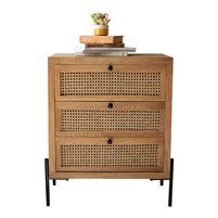 a wooden cabinet with two drawers and a potted plant sitting on top of it