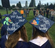 two students wearing graduation caps that say do you have your exit buddy? on them