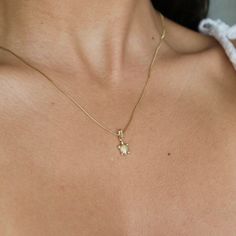 "14k Gold Turtle Necklace Charm, Sea Turtle Jewelry, 14K Gold Turtle Necklace, Yellow Gold Sea Turtle Necklace Charm, Dainty Turtle Necklace, Can be worn with other necklaces, great for layers. A Perfect 14K Gold gift. . . . * Pendants Measurements With Bail: ((17 x 8 mm) * Chain is included ( 1MM Box Chain) * Stamp: Real 14k Gold * Never gold filled or plated * Packaged With Free Gift Box . . . If you have any questions, just hit the \"Message the Seller\" button ( bottom right of the page) and Gold Turtle Necklace, Fine Jewelry Charm Necklace In Yellow Gold, Fine Jewelry Yellow Gold Charm Necklace, Yellow Gold Hallmarked Charm Necklace, Fine Jewelry, Hallmarked Yellow Gold Charm Necklace, Fine Jewelry 14k Stamped Pendant Charm Necklace, Gold Diamond Cut Charm Necklace Fine Jewelry, Sea Turtle Jewelry, Sea Turtle Necklace