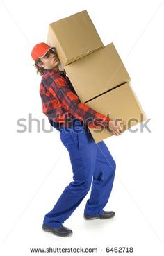 a man carrying boxes on his back while wearing an orange hat and blue pants,