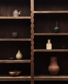 shelves with vases and other items on them