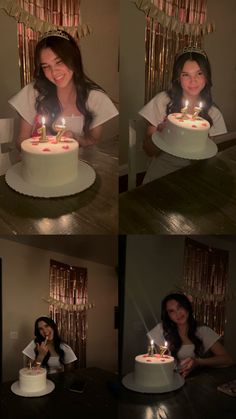 a woman sitting in front of a white cake with lit candles on top of it