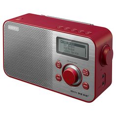 the radio is red and silver, with an alarm clock on it's side