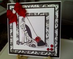 a card with a shoe and red bow on it