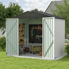 a garden shed with the doors open and tools in it's storage compartment outside