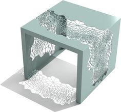 an artistically designed side table with intricate cutouts on the top and bottom, against a white background