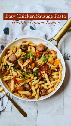 a white bowl filled with pasta and sausage