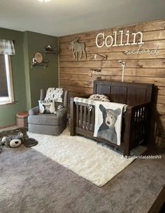 a baby's room with a crib, chair and teddy bear on the wall