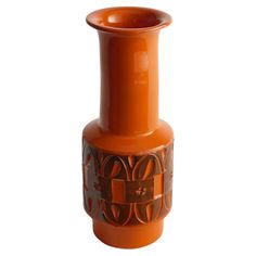 This vibrant orange mid-century modern stoneware vase exemplifies the exceptional craftsmanship of Fratelli Fanciullacci, a renowned Italian pottery maker. Marked with "9781 ITALY," this piece stands 19.5 cm high with a base measuring 6.2 cm, showcasing its elegant proportions and detailed artistry. The vase features a vibrant orange glaze with intricate carved decorations, characteristic of Fratelli Fanciullacci's ability to blend traditional techniques with contemporary designs. ABOUT FRATELLI Pottery Makers, Owl Vase, Orange Glaze, Ikebana Vases, Vase Art, Green Glass Vase, Hand Painted Vases, Italian Pottery, Head Vase