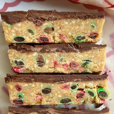 three pieces of chocolate and candy bars on a plate