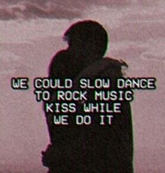 the silhouette of a person standing in front of a sign that says we could slow dance to rock music, kiss while we do it