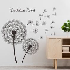 the dandelion flower wall decal is shown in black and white, with an inscription