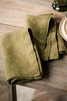 Handmade from super-soft Lithuanian linen, this pre-washed napkin set is a welcome addition to the table. Easy to care for, each napkin just gets better with age. | Lithuanian Linen Napkins, Set of 2 in Green at Terrain Lithuanian Culture, Bee Napkins, Table Wear, Plaid Tablecloth, Farmhouse Pottery, Embroidered Napkins, Leather Apron, Creative Living, Hand Poured Candle