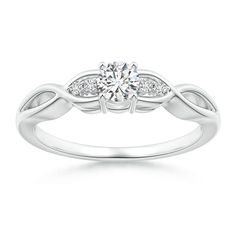 a white gold ring with diamonds on it