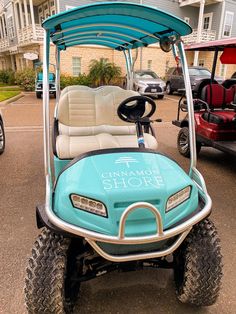 a blue golf cart parked in front of a building