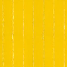 yellow and white striped fabric with small dots