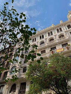 the building has many balconies on it's windows and balconies