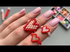 Brick stitch beaded heart ring Heart Ring Beads, Brick Stitch Ring, Heart Ring Tutorial, Diy Beaded Heart, Beaded Heart Ring, Beaded Heart, Ring Tutorial, Seed Bead Tutorial