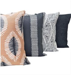 four pillows with different patterns on them