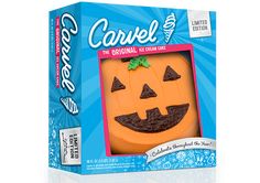 an orange halloween cake in a box on a white background with the words carel over it