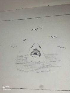 a drawing of a shark in the water