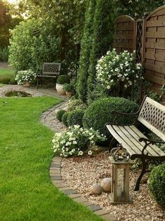 a bench in the middle of a garden