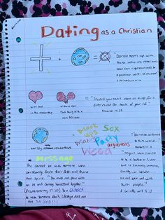 a notebook with some writing on it that says dating as christian and has pictures of the cross