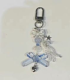 a key chain with charms attached to it