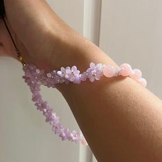 This phone charm strap is about 9 inches / 22 cm long. Beads Strap, Phone Plug, Phone Strap, Flower Beads, Pink Beads, Phone Charm, Mobile Phone Accessories, Phone Accessories, Norway