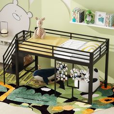 a child's bunk bed with a desk underneath it and stuffed animals on the floor