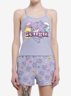 a woman with short shorts and a tank top that says genga on the front