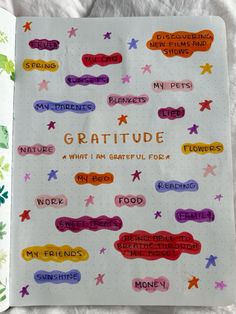 a notebook with writing on it that says,'i am grateful for my friends '