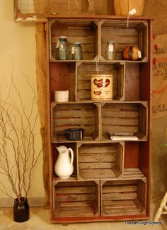 an old wooden shelf with many items on it