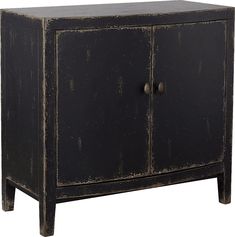 an old black cabinet with two doors