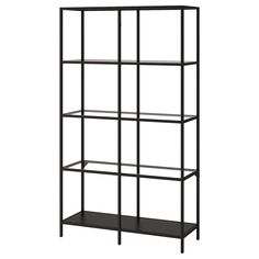 a black bookcase with four shelves on each side and one shelf in the middle