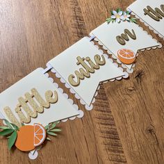 an orange themed banner on a wooden table