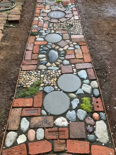 a walkway made out of bricks and stones