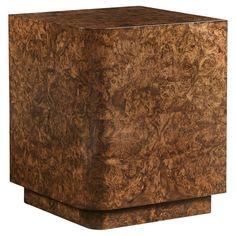 a wooden block with an intricate design on the front and sides, made out of wood veneers