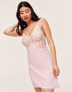 Our lovely and romantic Raquel slip dress is unlined, has adjustable ties in the back, and is made from sheer georgette and lace in a beautiful bright white. It's the perfect lingerie to add some romance to your night. (Available in sizes XS-XL.) Chic Bra, Adore Me, White Slip, Bra And Panty Sets, V Neckline, Medium Blue, Lingerie Set, Bright White, Apparel Accessories