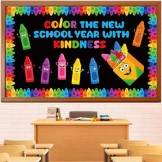 a classroom wall with crayons and the words color the new school year with kindness