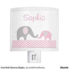 an elephant night light with pink and gray chevrons on the bottom, which reads personalized